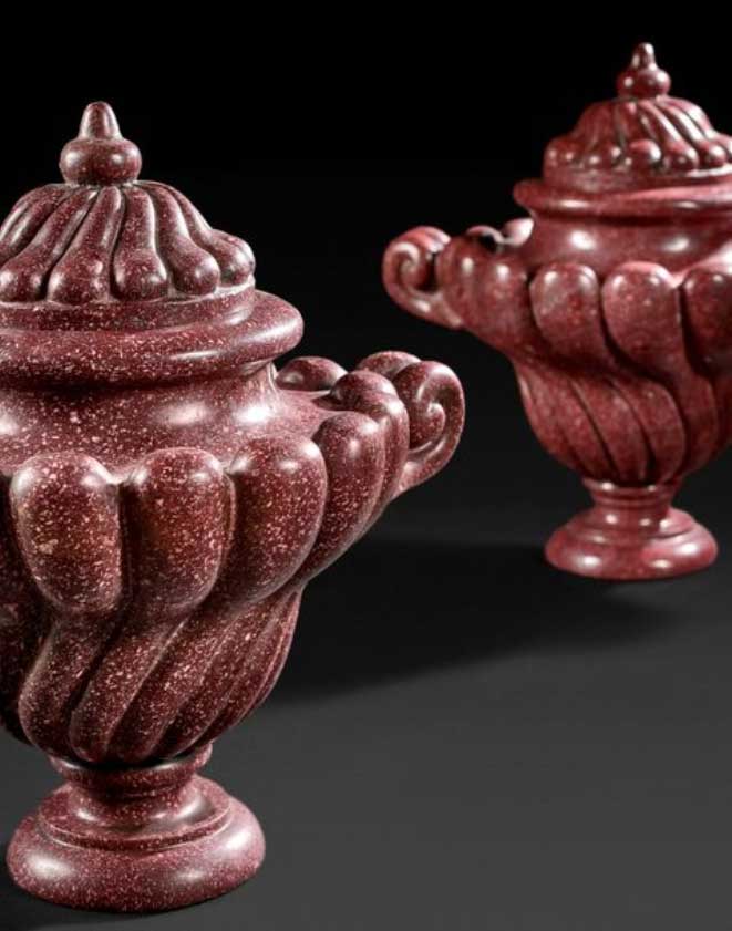 Deux vases en porphyre d’égypte à godrons torses et anses en enroulement